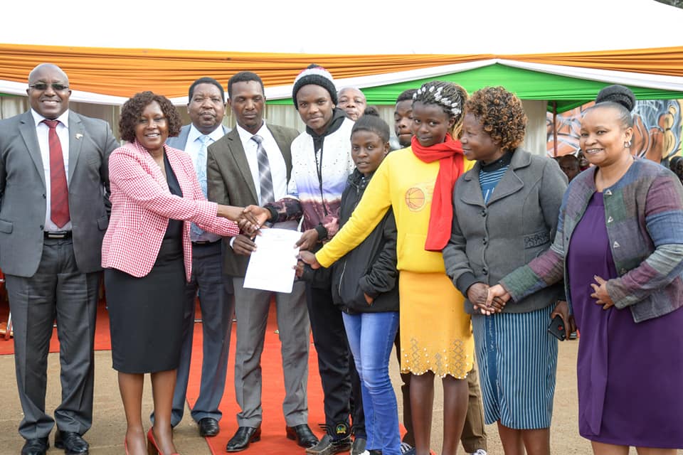 University students from Embu County receiving bursary awards